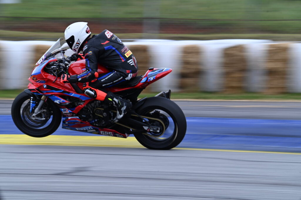 a race motorcycle wheeling