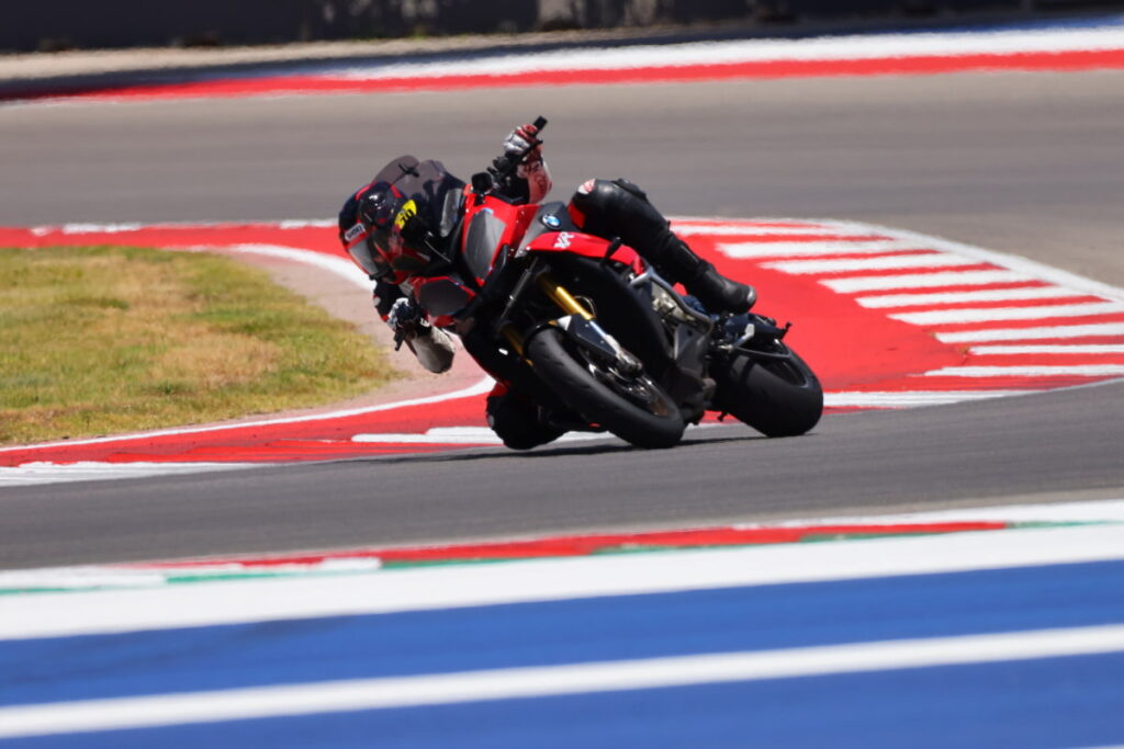 A motorcycle racer at COTA leaning into the Apex - Cuban Rider
