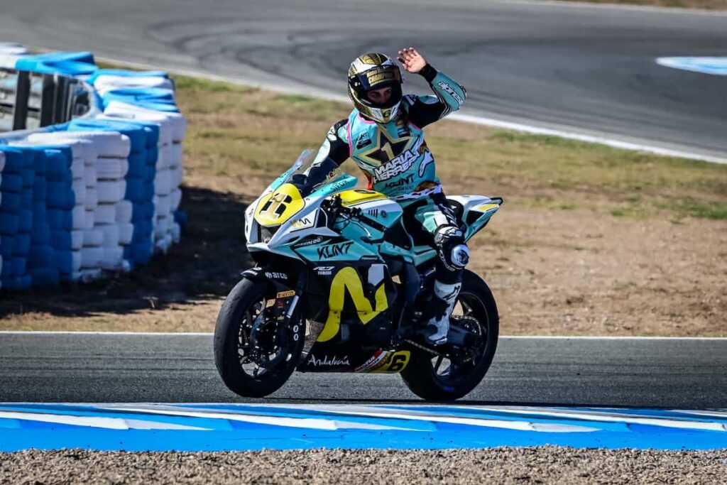 a woman on a race bike