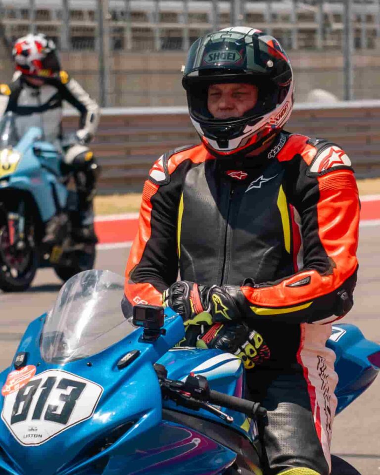 a motorcycle track racer on the grid