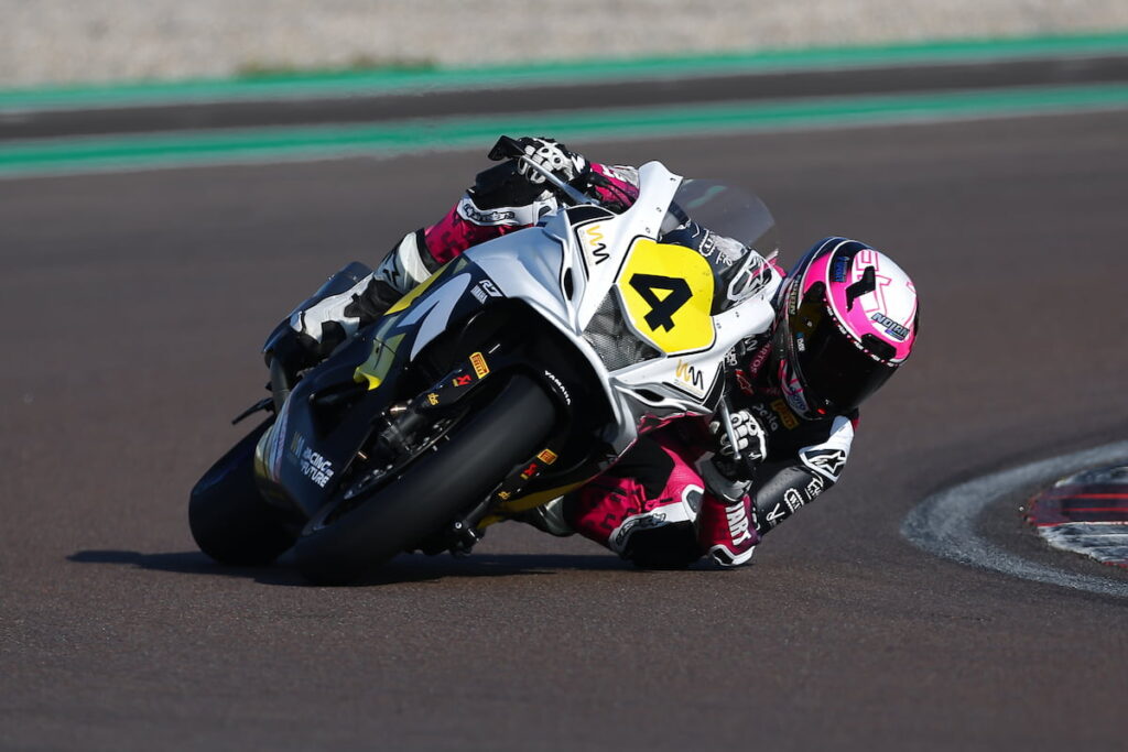 women motorcycle racer at the apex