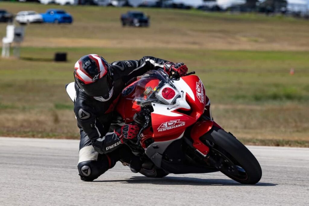 Sean Beenaam Sean Beenaam TrackDNA A track rider on a red R6 at the apex