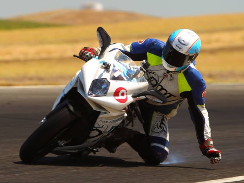 A motorcycle track racer at the Apex