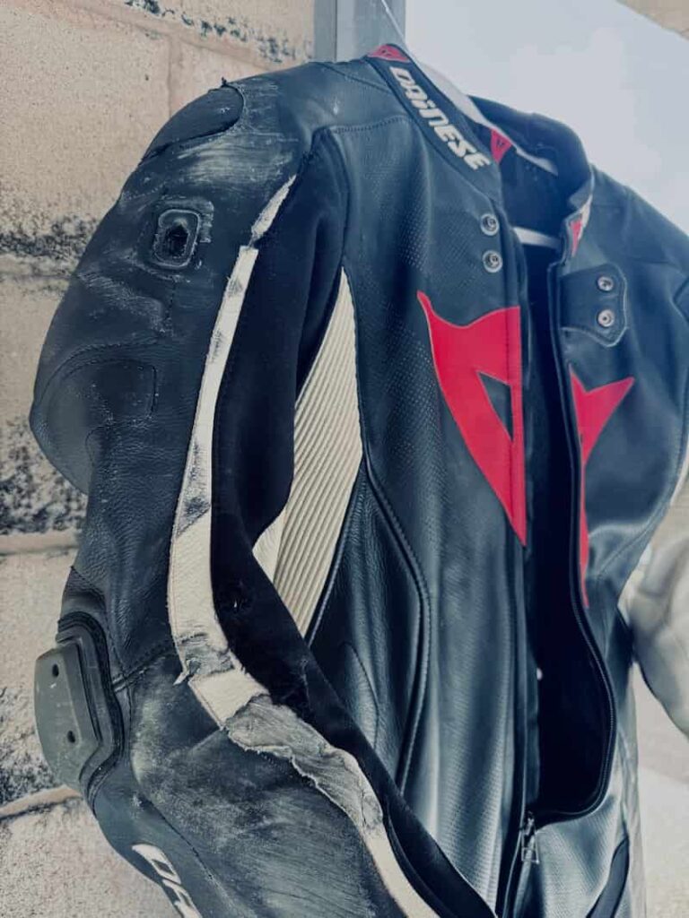 scuffed Dainese racing leather