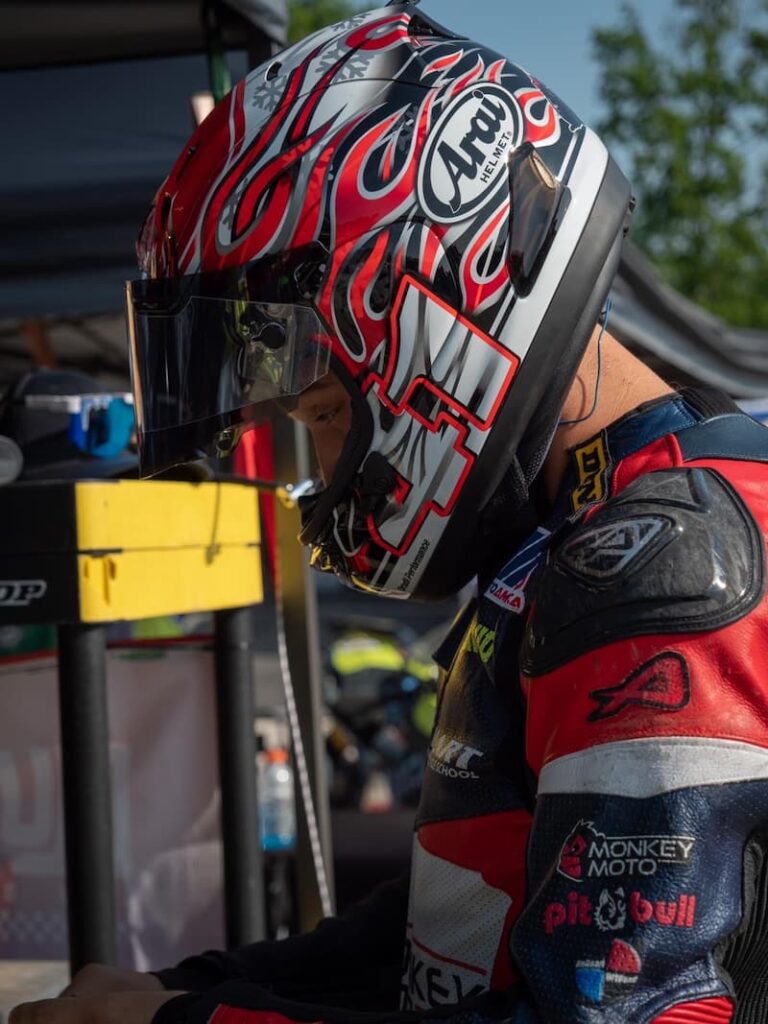 a motorcycle racer in his helmet
