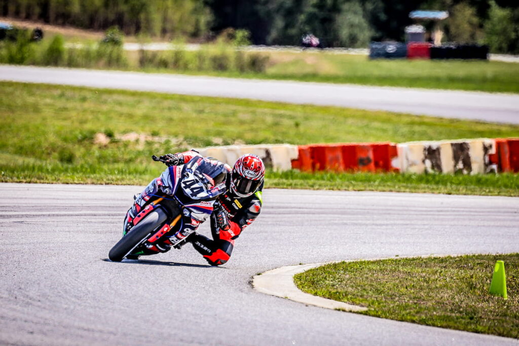 a racer leaned the motorcycle on track