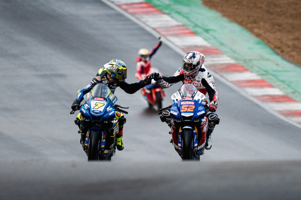 3 motorcycle racers on track