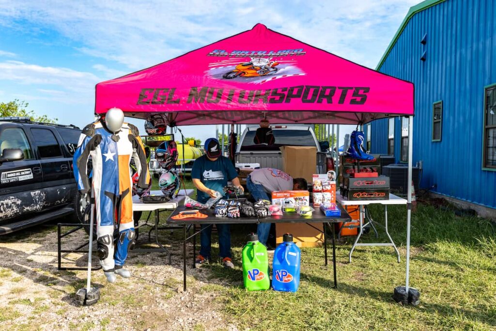 A vendor setting up the tent